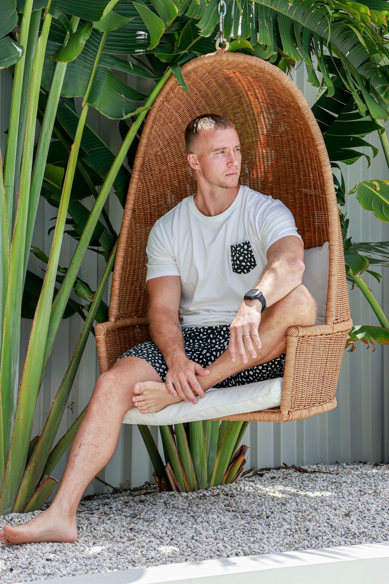 Man wearing pyjamas set black and white spots 